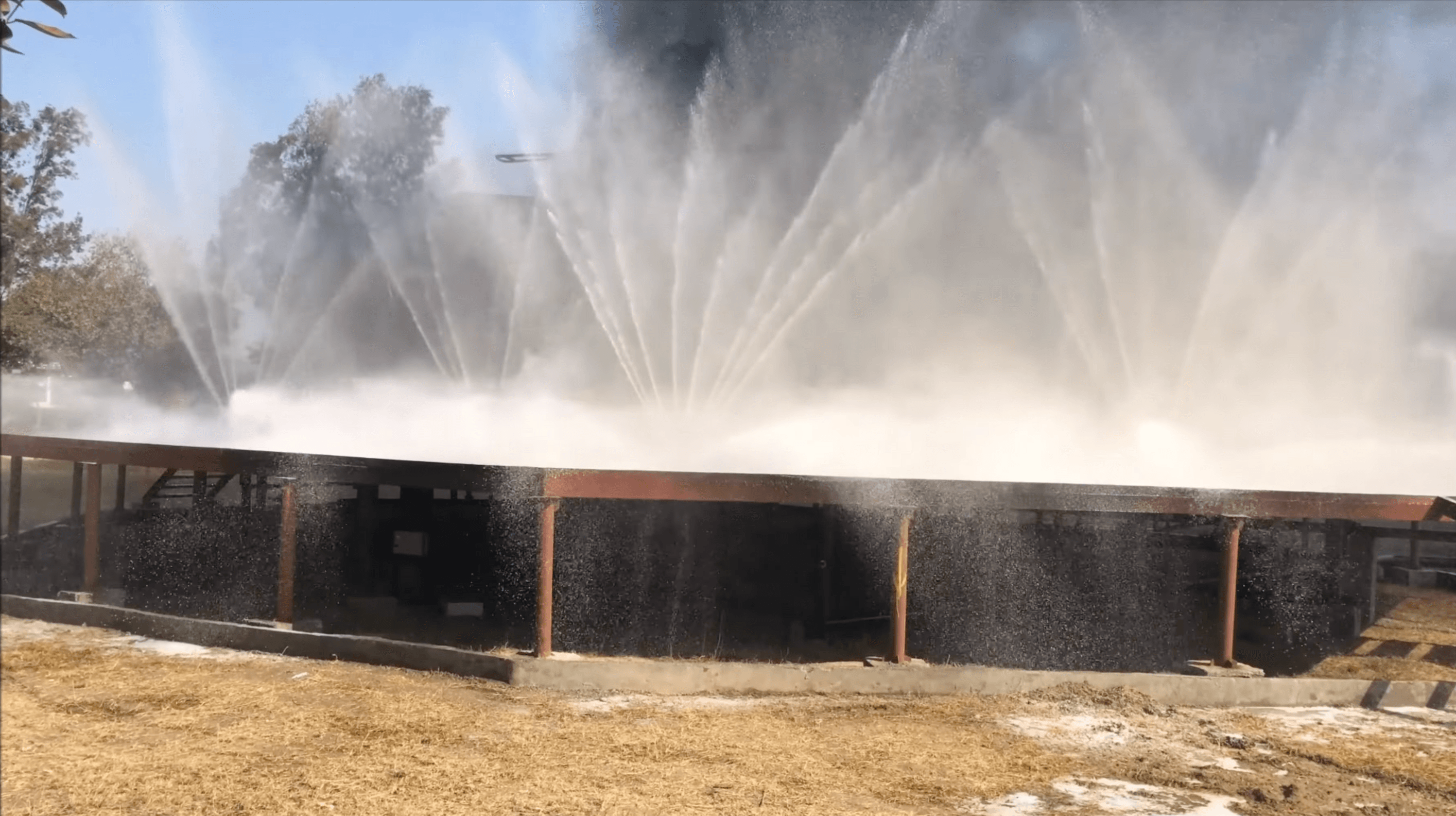 Daytime suppression system test with water curtain